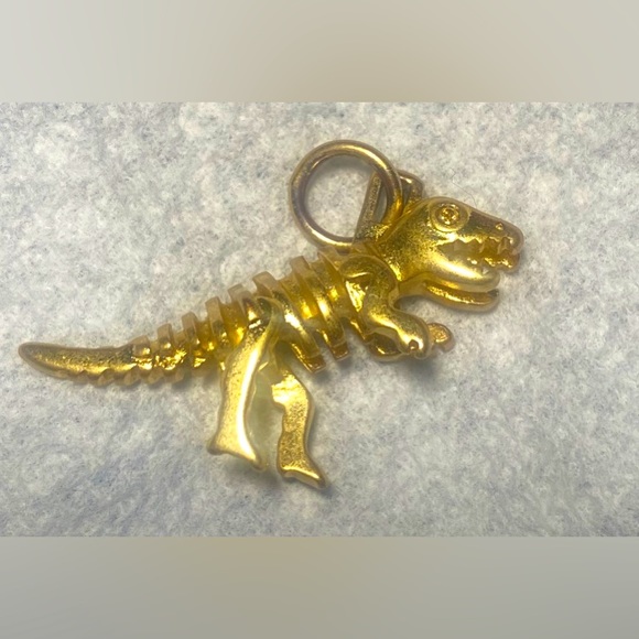 Coach Jewelry - Coach Gold tone Rexy Charm 1”